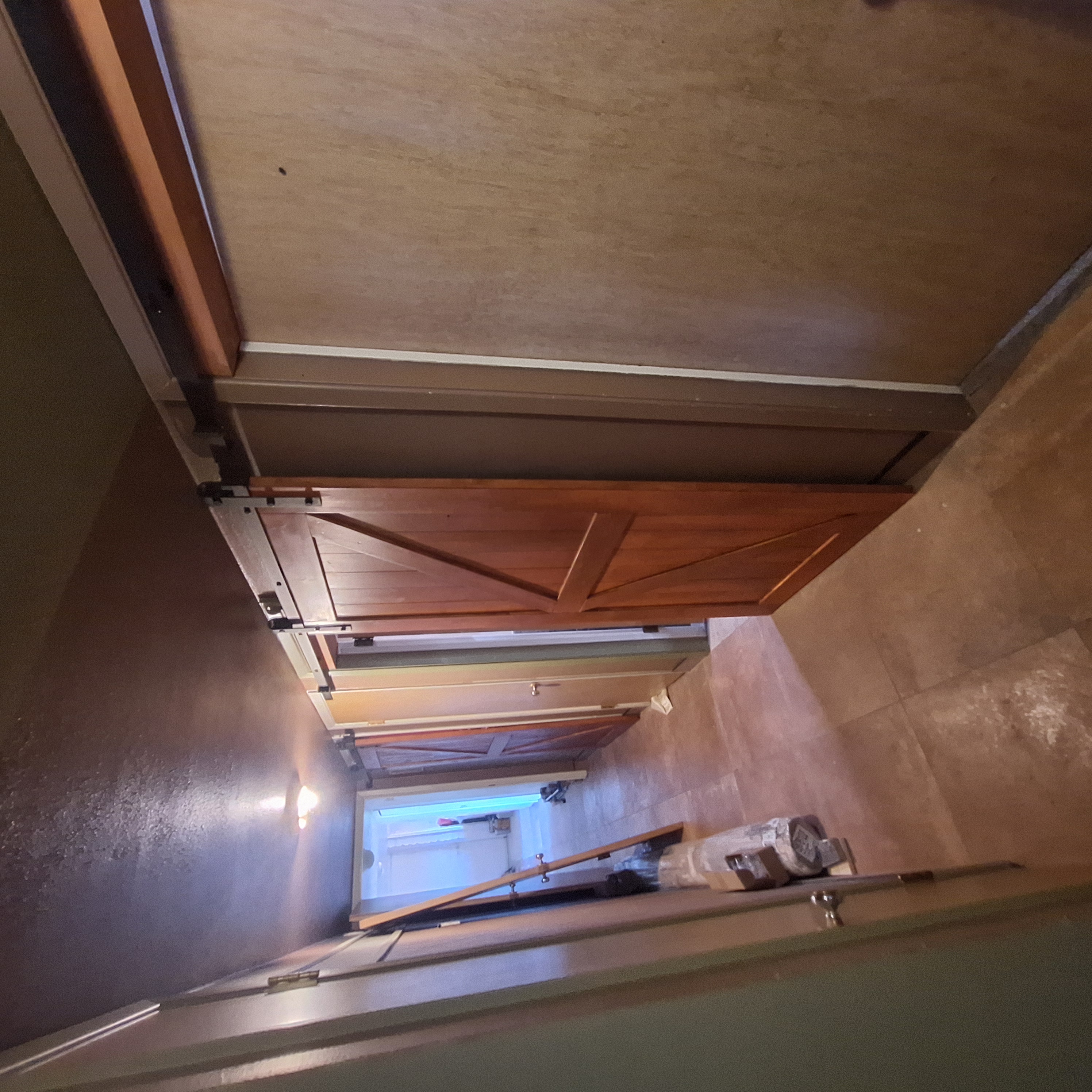 Hallway with Barn Doors and New Floors