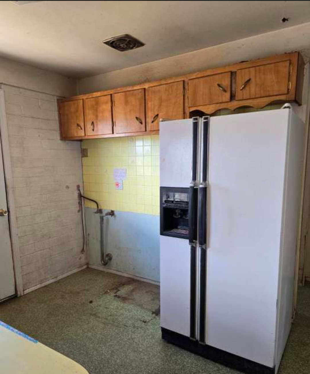 Before — original appliance wall